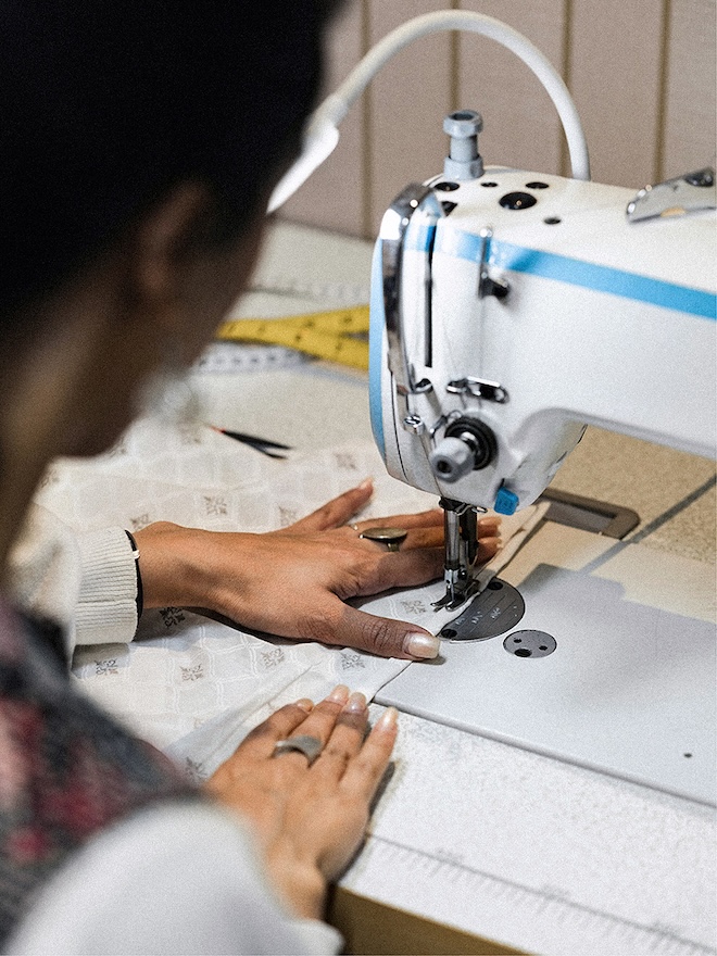 Sewing machine being used