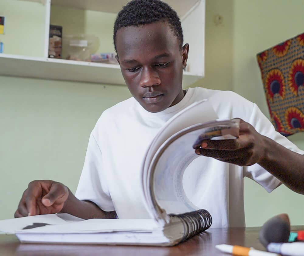 Student working with a textbook