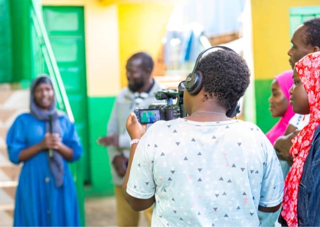 A student films a video interview